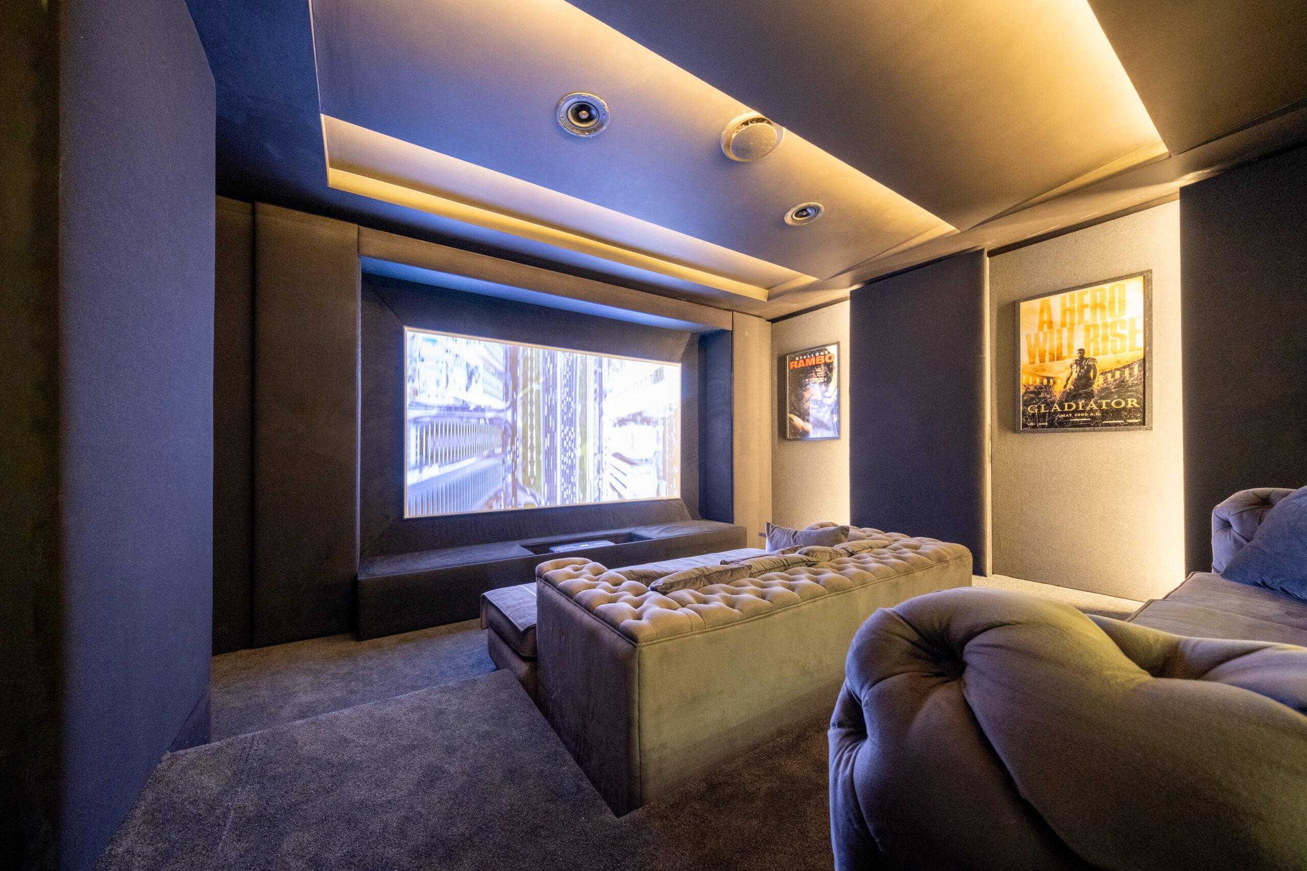 Front view of Durbanville home cinema with floating 120-inch screen and M&K Dolby Atmos ceiling speakers
