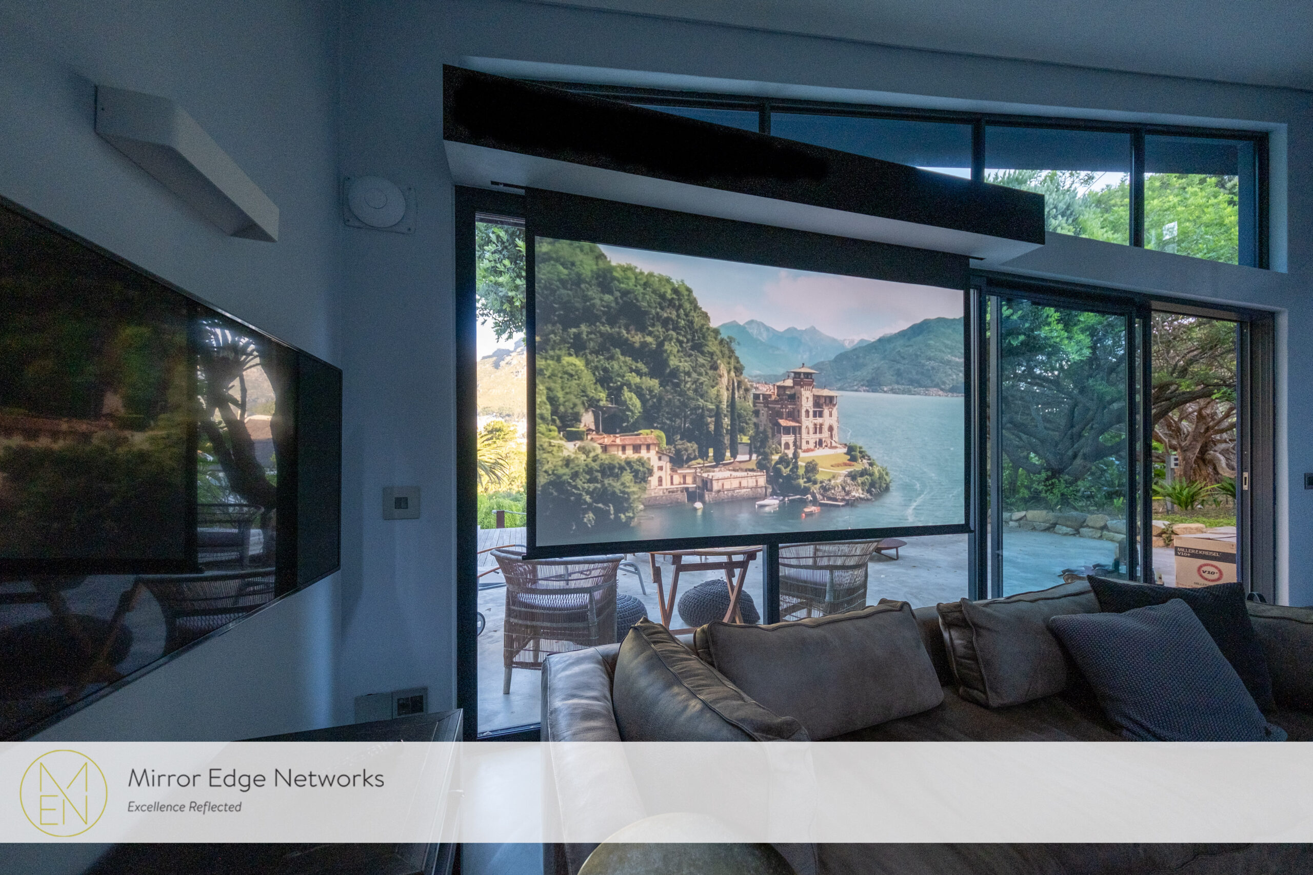 Motorised projection screen and concealed front speaker enclosure