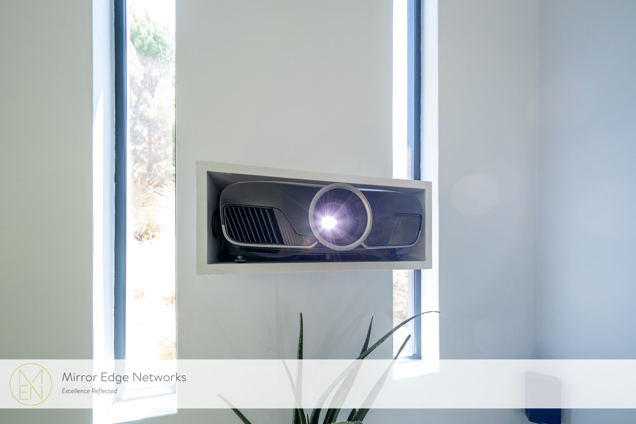 Epson TW9400 projector in a purpose-built wall enclosure